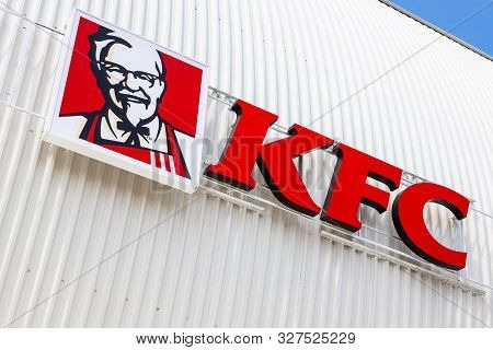 Minsk, Belarus - July 20, 2019: Kfc Fast Food Restaurant Logo On White Ribbed Facade Background, Dia