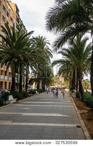 Denia, Valenciana, Spain - Sept 23 2019 : Streets Of Denia With Tourists Wandering Around.