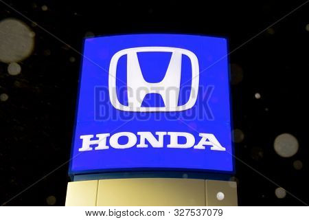Bemidji, Minnesota, October 12, 2019: Snowflakes Are Falling On The Honda  Logo Sign, Which Honda Lo
