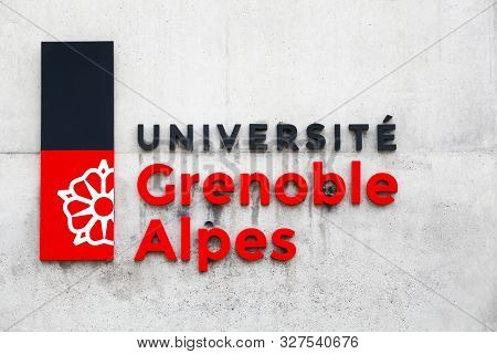 Grenoble, France - June 15, 2019: Grenoble University Building And Symbol On A Wall. The University 
