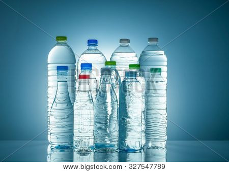 Set Of Transparent Plastic Water Bottle With Blank Label. Clear Water And Natural Mineral Bottle Wit