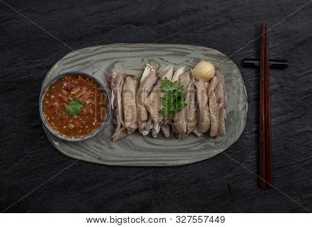 Asian Food Style Marinated Steamed Chicken (betong Chickken) And Sauce On Ceramic Plate. Serving Chi