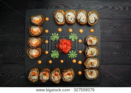 Hotto Set Of Sushi Rolls On Black Stone