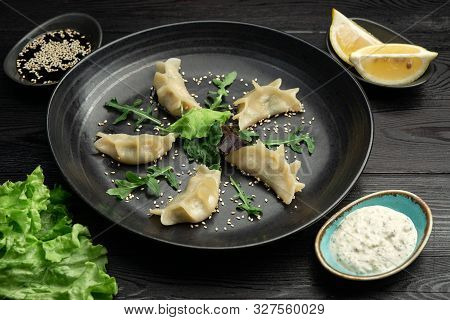 Gedza Syumai Steamed Chinese Dumplings With Shrimp And Vegetables, Served With Sauce