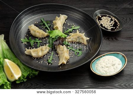 Gedza Syumai Steamed Chinese Dumplings With Shrimp And Vegetables, Served With Sauce