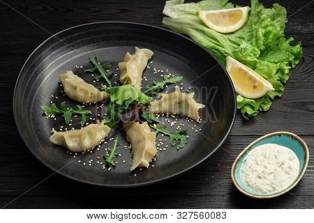 Gedza Syumai Steamed Chinese Dumplings With Shrimp And Vegetables, Served With Sauce
