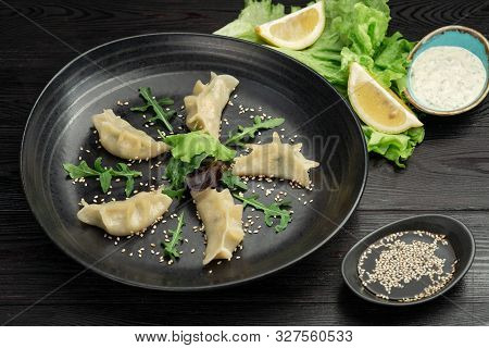 Gedza Syumai Steamed Chinese Dumplings With Shrimp And Vegetables, Served With Sauce