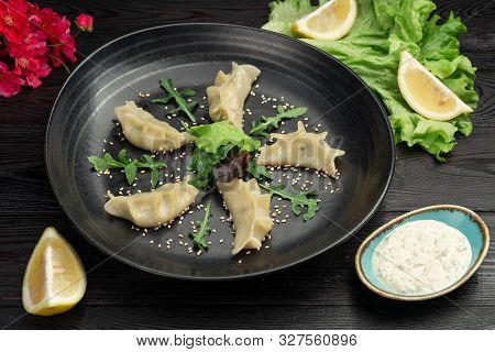 Gedza Syumai Steamed Chinese Dumplings With Shrimp And Vegetables, Served With Sauce