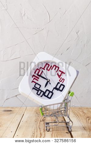 Buying Time. Buy Few More Hours. A Clock In Shopping Cart. Purchase Time. Copy Space