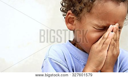 Little Boy Praying To God Stock Image With Hands Held Together With Closed Eyes  Stock Photo