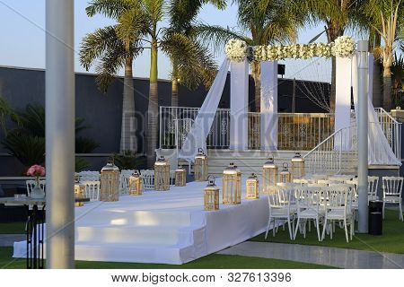 Beautiful Photo Of The Jewish Hupa , Wedding Putdoor .two Glasses And Bottle Of Wine And Glass It Is