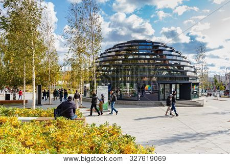 Moscow, Russia - October 08, 2019: People Walking Near Zaryadye Dome Building In Sunny Autumn Day. Z