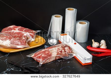 Sous Vide Technology . Kitchen Machine For Packing Meat And The Rolls Of The Package.