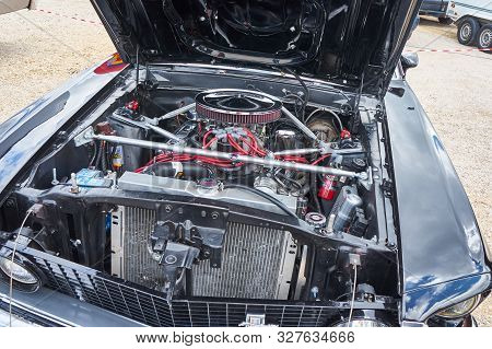Pontarlier - Bourgogne Franche Comté France - June 16th 2019 - The Hood Of A Black Ford Mustang 351 