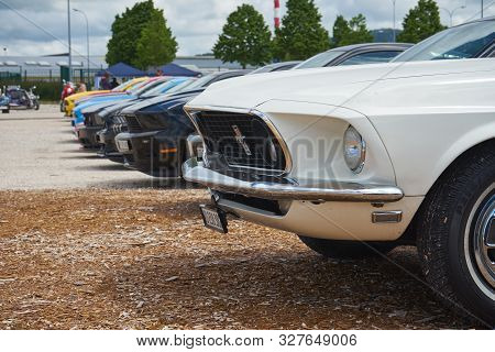 Pontarlier - Bourgogne Franche Comté France - June 16th 2019 - Line Of Various Colours Ford Mustang 