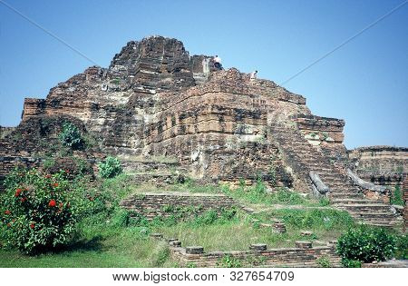 The Ancient Ruins Of Wat Phra Mahathat In Ayutthaya, Thailand.