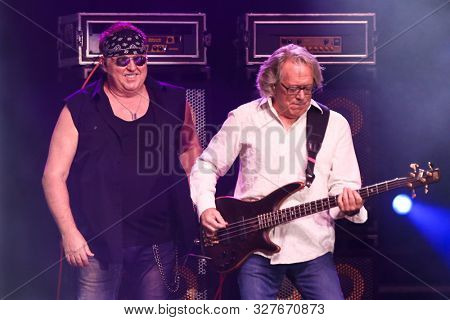 HUNTINGTON - OCT 10: Mike Reno (L) and Ken Sinnaveve perform in concert at the Paramount on October 10, 2019 in Huntington, New York.