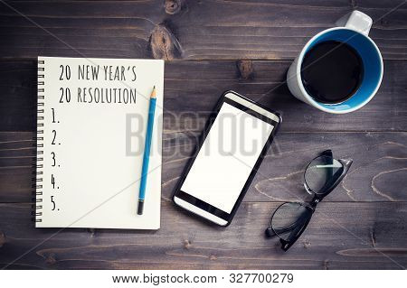 New Year Goals, Resolution Or Action Plan 2020 Concep. Office Wood Table With Blank Notepad, Pencil,