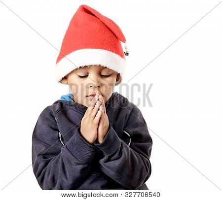 Little Boy Praying To God At Christmas Stock Image With Hands Held Together With Closed Eyes  Stock 