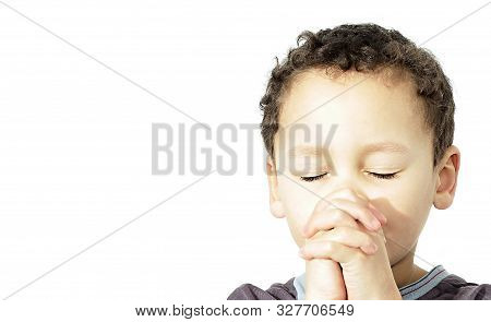 Little Boy Praying To God Stock Image With Hands Held Together With Closed Eyes  Stock Photo