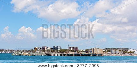 Industrial Export Import Wharf Beside A Recreational Marina In An Australian City