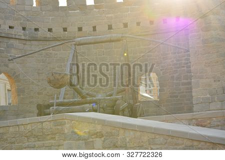 Old Iron Cannon Balls Painted In Black Arranged In Pyramid Shape