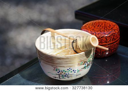 Japanese Matcha Green Tea In A Ceramic Bowl With Tea Whisk
