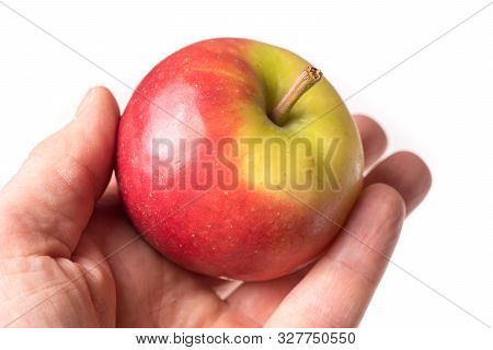Causasian Hand Holding Apple Isolated On White Background