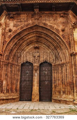 Beautiful Santisima Trinidad Church Entrance, Gothic Style In La Plaza Mayor In Alcaraz, Spain