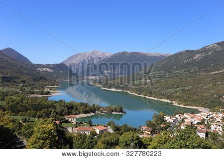 Barrea, Italy - 12 October 2019: Lake Barrea And The Mountain Village