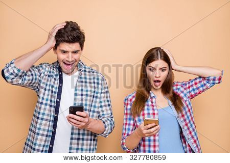 Portrait Of His He Her She Nice Attractive Charming Amazed Worried Puzzled Couple Wearing Checked Sh