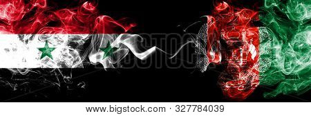 Syria Vs Afghanistan, Afghani Smoke Flags Placed Side By Side. Thick Colored Silky Smoke Flags Of Sy