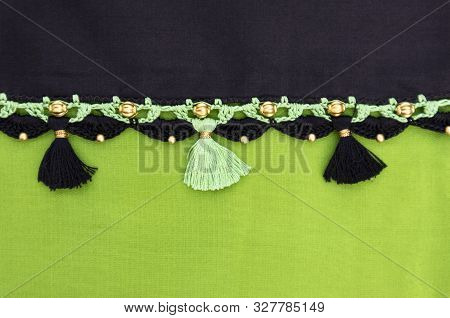 Crochet, Tassel Fashion Designing Works On On Green Saree Border.