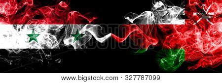 Syria Vs Oman, Omani Smoke Flags Placed Side By Side. Thick Colored Silky Smoke Flags Of Syrian And 