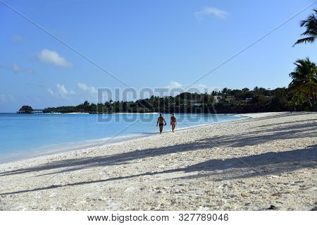 Kendwa, Zanzibar - October 3, 2019: Kendwa Resort, Beautiful Beach With White Sand And Tourist Coupl