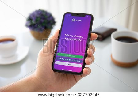 Anapa, Russia - October 3, 2019: Man Holding Iphone 11 With Music Service Spotify On The Screen. Iph