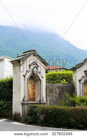 Christian Icon Fresco Near Church In Mandello Del Lario, Italy.