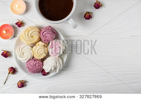 Mini Marshmallows With Different Flavors On A White Plate With A Cup Of Hot Chocolate. Flat Lay On W