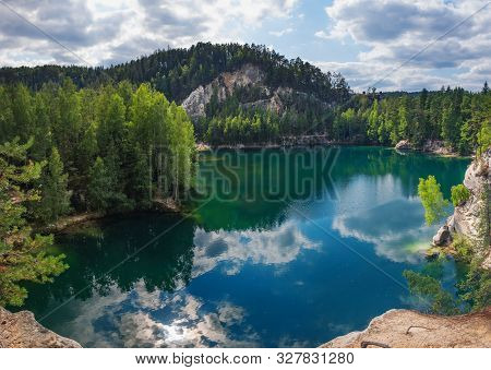Lake And Ancient Pines Growing Between Them Located In Rock City Adrspach, National Park Of Adrspach