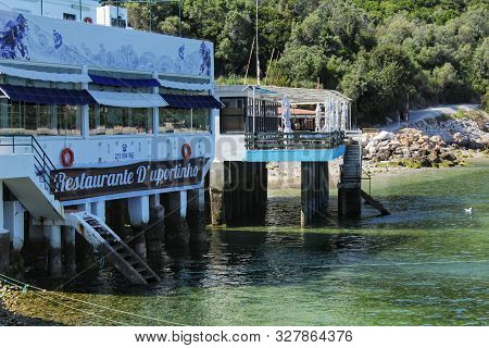 Lisbon, Portugal- May 22, 2018: Restaurant On The Beach In Portinho, Lisbon, Portugal In A Sunny Day