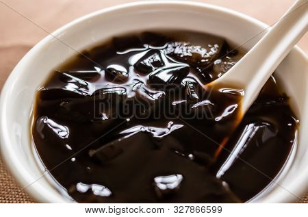 traditional Taiwanese snacks of mesona black herbal tea in a bowl