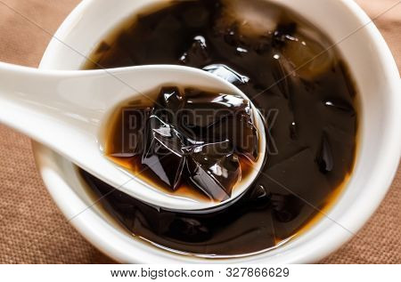 traditional Taiwanese snacks of mesona black herbal tea in a bowl