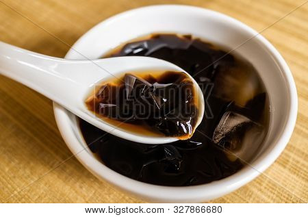 traditional Taiwanese snacks of mesona black herbal tea in a bowl