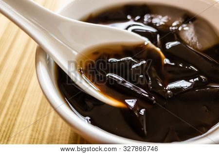 traditional Taiwanese snacks of mesona black herbal tea in a bowl