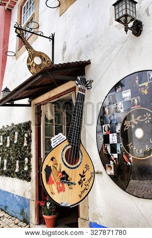 Lisbon, Portugal- June 3, 2018: Shop Of Fado Music.narrow And Colorful Streets, Majestic Facades, Wi