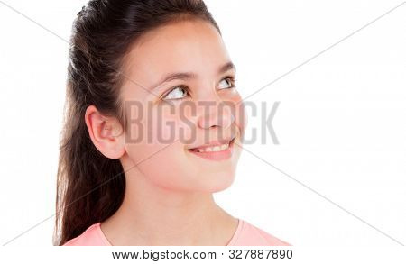 Adorable girl with twelve years old looking up isolated on a white background