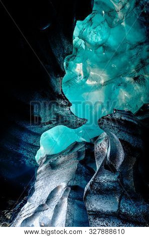 Blue crystal ice cave, underground beneath the glacier in Iceland, Europe