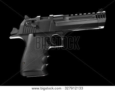 Black Semi Automatic Pistol On A Black Background