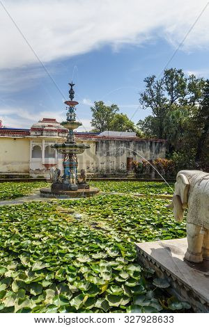 Lotus Pool And Marble Elephants In Saheliyon Ki Bari Gardens Or Courtyard Of The Maidens In Udaipur.