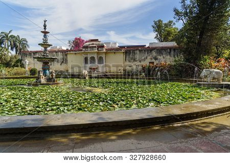 Lotus Pool And Marble Elephants In Saheliyon Ki Bari Gardens Or Courtyard Of The Maidens In Udaipur.